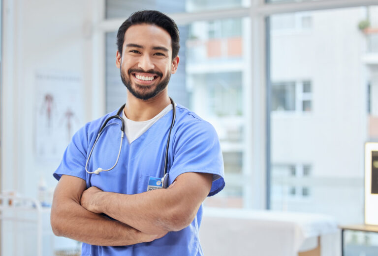 Doctor in scrubs with stethoscope.