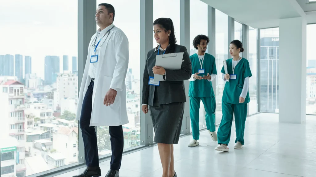 medical business executives and doctors on their way to a meeting.
