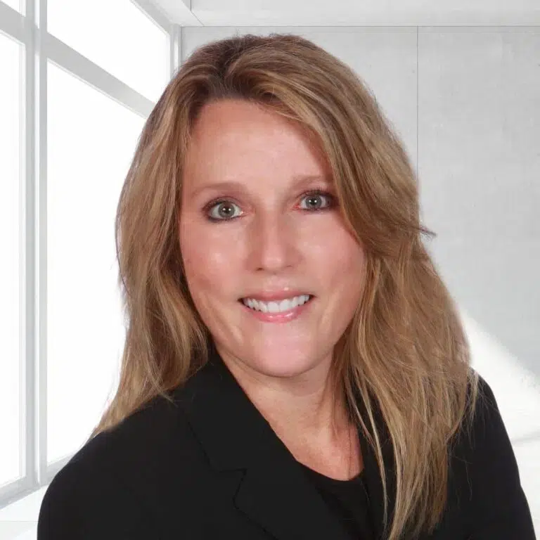 Woman with long hair in office.
