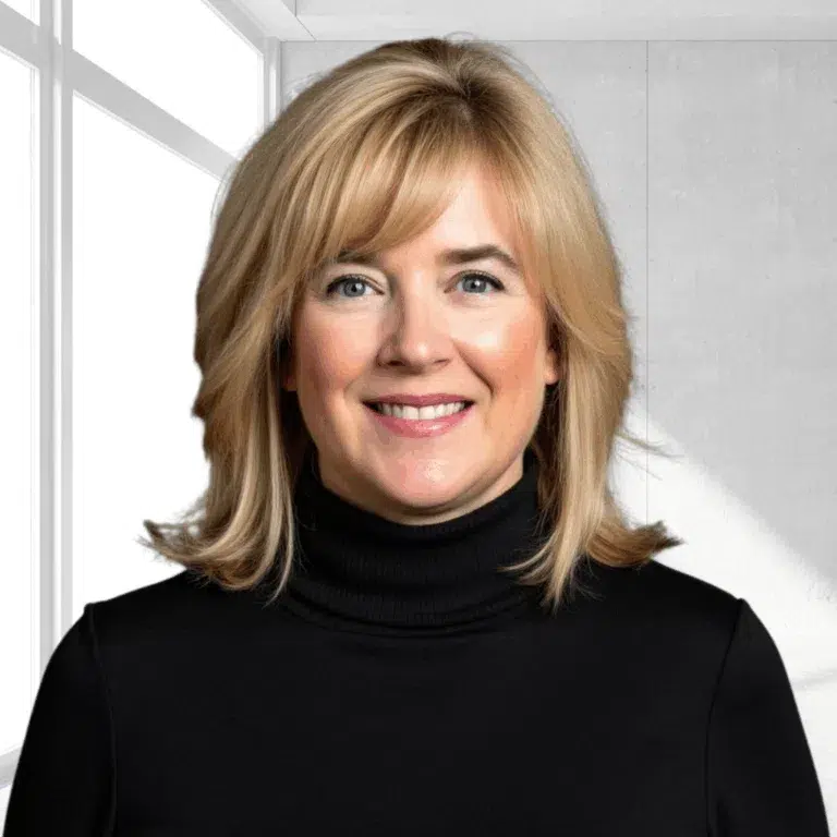 Woman with blonde hair in turtleneck.