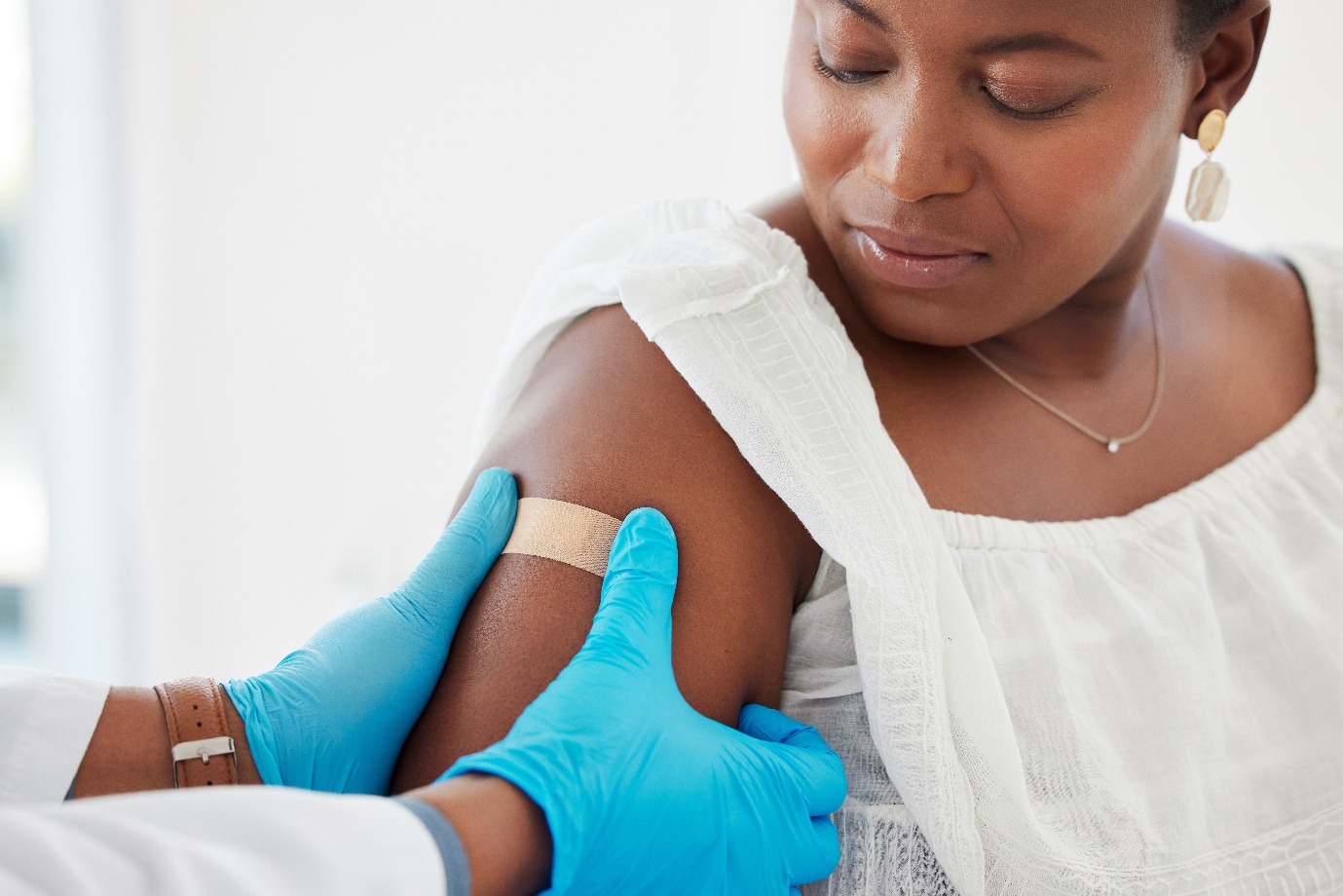 Person receiving a vaccination shot