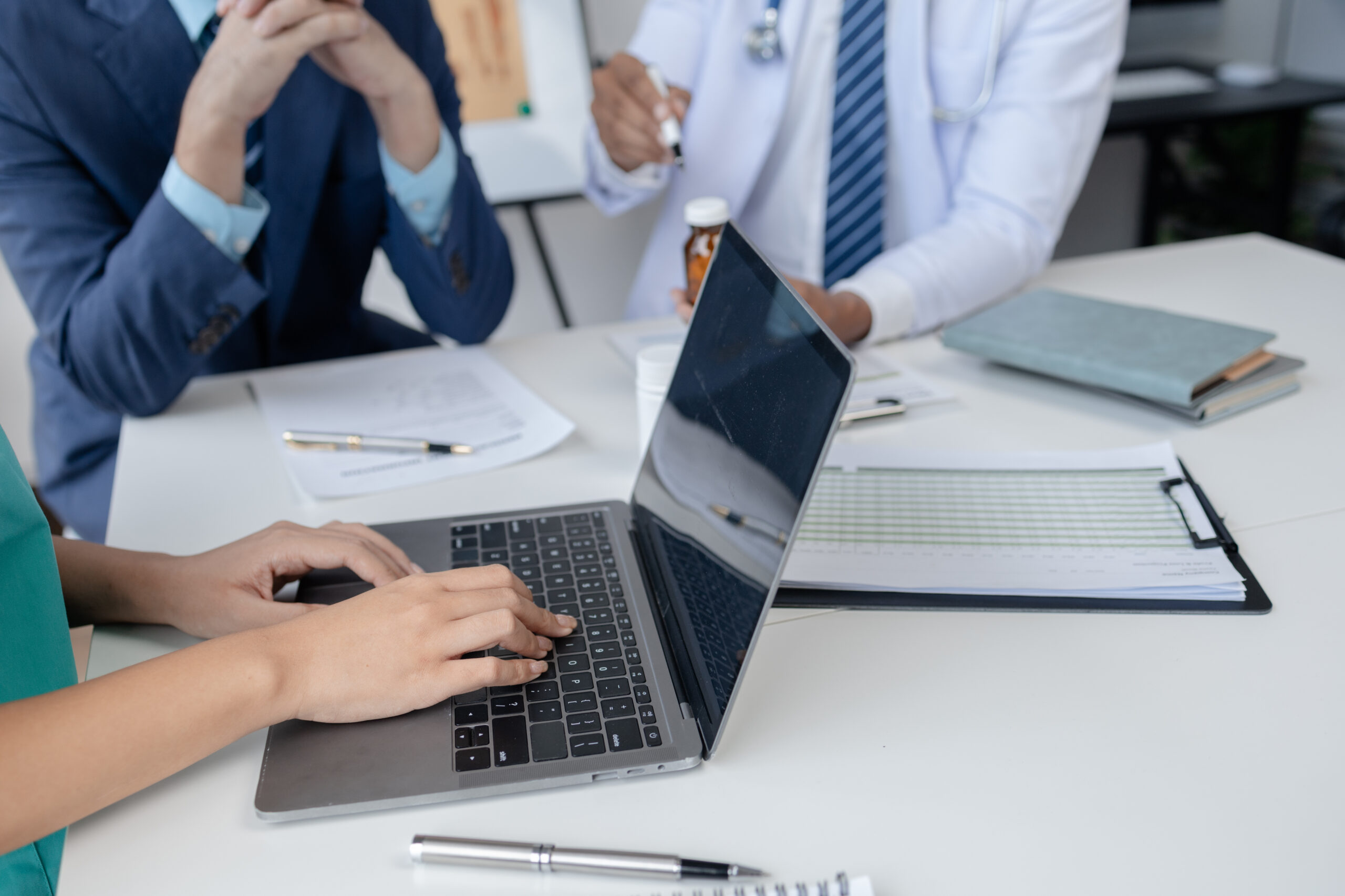 Medical professionals discussing healthcare technology