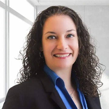 Professional woman in business attire.