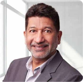 Man in a suit, professional setting.