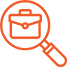 Magnifying glass over briefcase icon