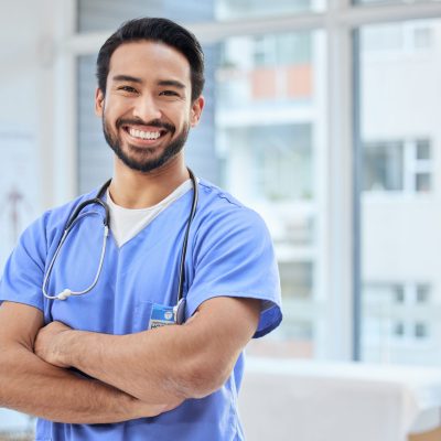 Doctor in scrubs with stethoscope.